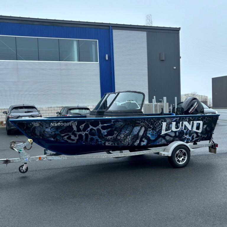 Custom vinyl boat graphics and registration numbers by AR Graphic